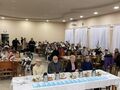 3.uczestnicy konkursu jury siedzą przy stołach