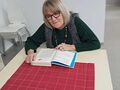 1. Pani bibliotekarka czyta książki dzieciom twórczość ks. Jana Twardowskiego 