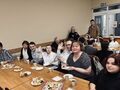 10.uczestnicy konkursu kolęd siedzą przy stołach